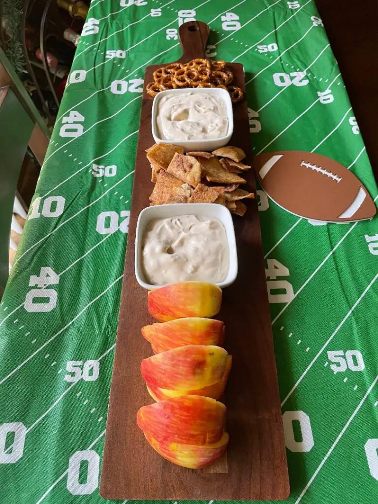 This Creamy Caramel Apple Dip is perfect for any occasion. Served with a variety of snacks such as chopped apples, crackers, and salty pretzels.