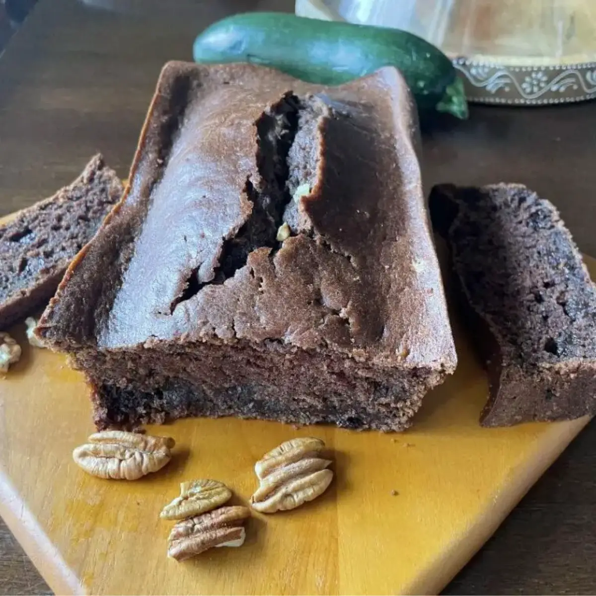 Moist and Delicious Double Chocolate Zucchini Bread garnished with walnuts