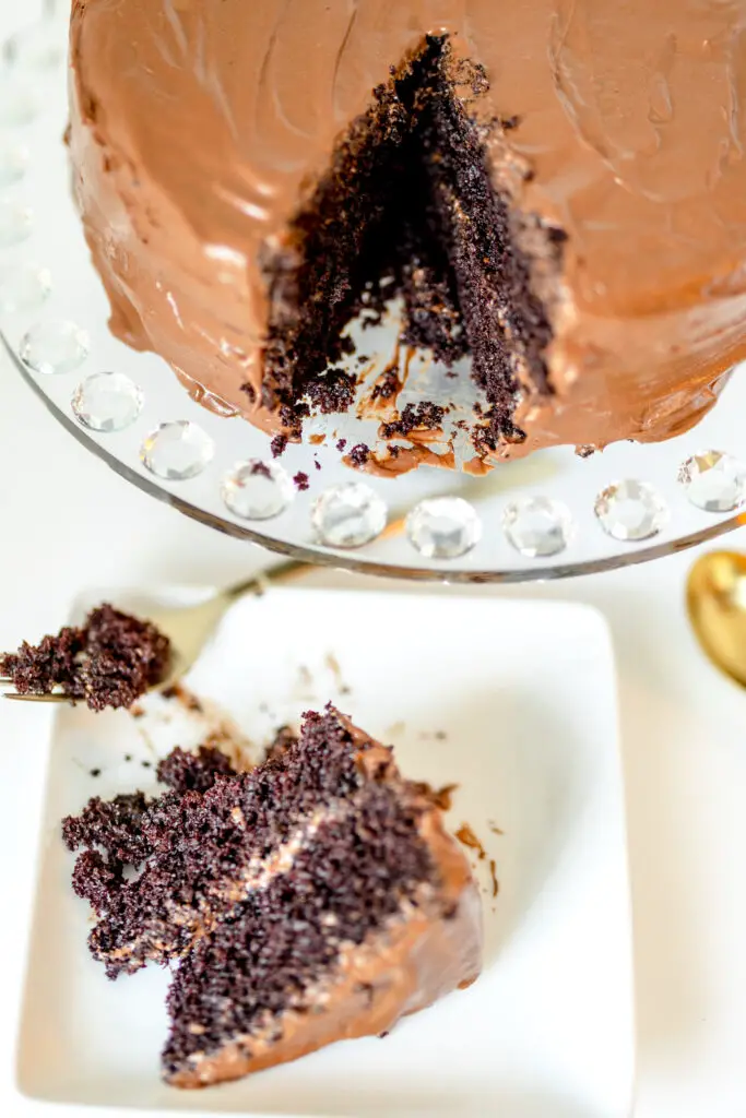 This Hershey's "Perfectly Chocolate" Chocolate Cake is super delicious, fluffy, moist, and topped with glowing chocolate cream cheese frosting.