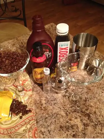 To make the delicious Chocolate Coffee Martini, I used small coffee granules that are so brown in color! Placing all the ingredients next to my transparent Martini glass for an easy to make drink!