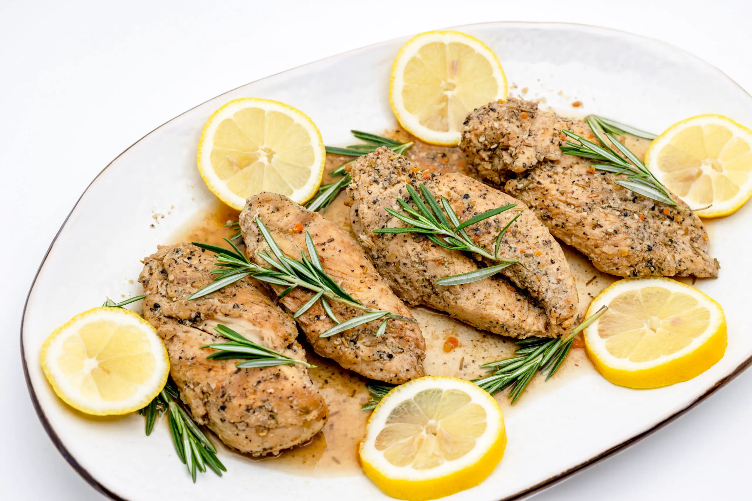 Garlic, rosemary, and chicken breast are deliciously combined for a perfect family dinner.