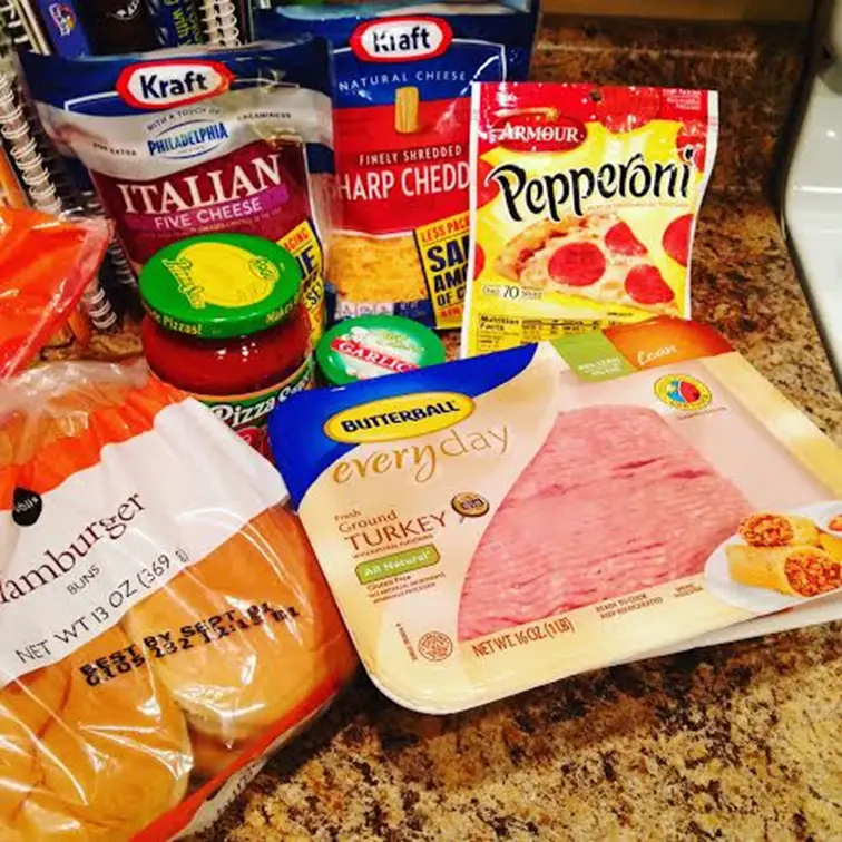 ingredients needed for pizza burgers. We have ground turkey, Italian sausage, pepperoni, pizza sauce, Mozzarella Cheese, and hamburger buns