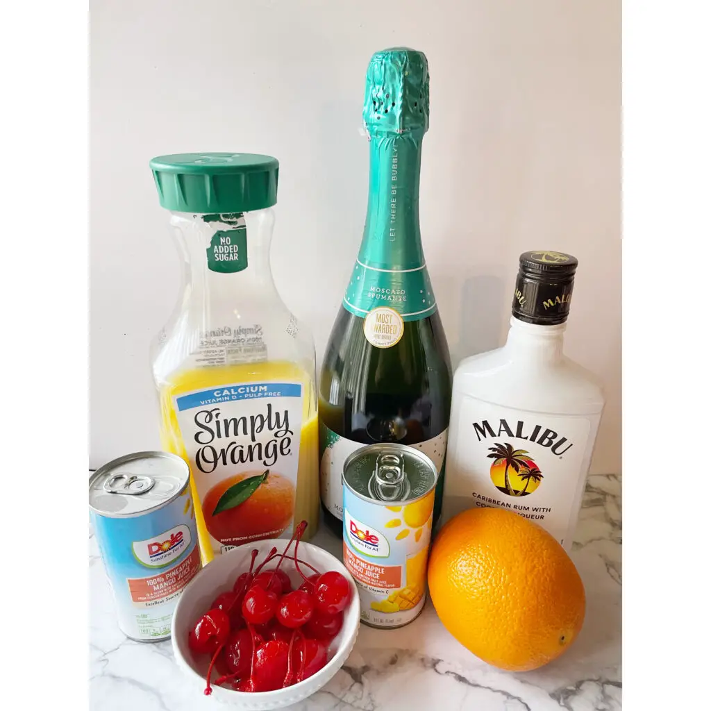 Sparkling Wine, Orange Juice, Pineapple Juice and Malibu Rum will make a perfect tropical mimosa cocktail that is deliciously fruity and super easy to prepare!
