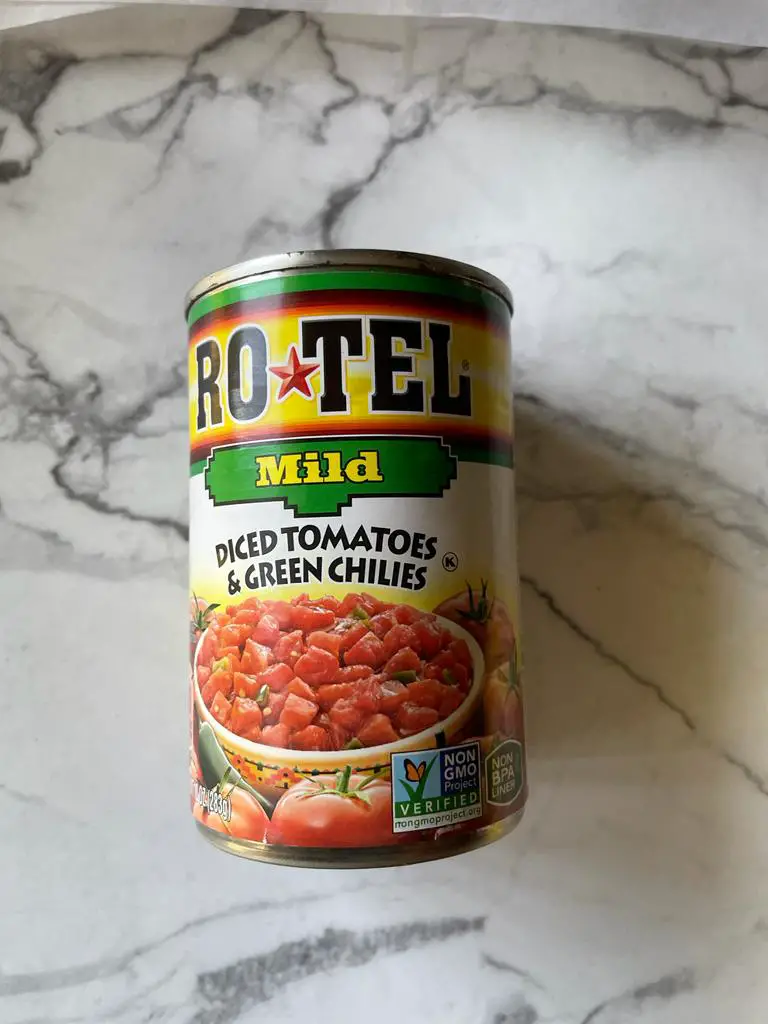 Add Rotel diced tomato and green chilies to your dip to give it a juicy taste.