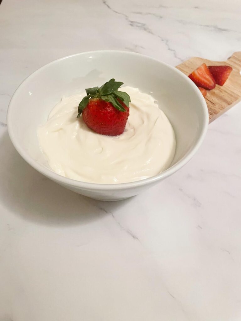 fruit dip with a strawberry in the middle